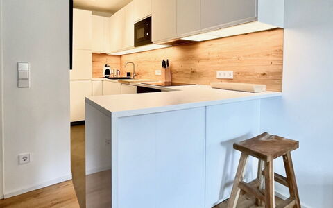 Auszeit: Countertop, Furniture, Interior Design, Kitchen, Flooring, Cabinetry, Floor, Wall, Wood, Kitchen Appliance