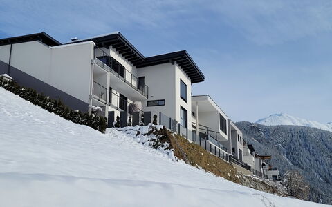 Aileen: Sky, Building, Cloud, Mountain, Window, Snow, House, Slope, Highland, Freezing