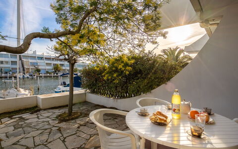 Les Marinas de la Plage Ii: Property, Yellow, Interior Design, Room, Building, Real Estate, Tree, Table, Furniture, Restaurant