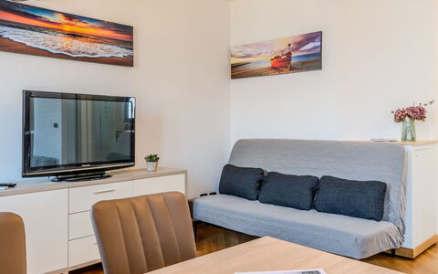 Blue Lake: Furniture, Interior Design, Room, Flooring, Floor, Couch, Picture Frame, Sea
