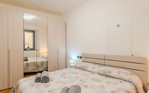 Blue Lake: Bed, Furniture, Interior Design, Bedroom, Flooring, Wood, Bed Sheet, Floor, Bedding, Room