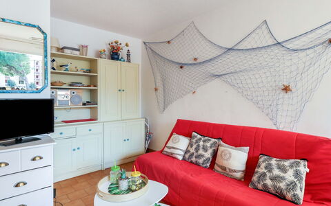 Le Lagon Bleu: Furniture, Property, Cabinetry, Couch, Interior Design, Living Room, Decoration, Comfort, Drawer, Building