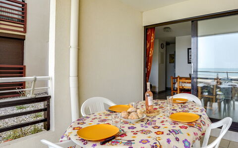 Cap D'Agde 905: Room, Yellow, Dining Room, Property, Interior Design, Table, Furniture, Orange, House, Building