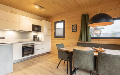 Superior #2 mit Ir-Sauna & Sprudelbad 20.12: Countertop, Cabinetry, Property, Furniture, Kitchen, Wood, Table, Interior Design, Building, Lighting