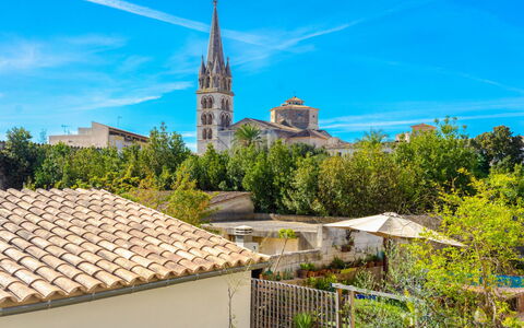 Can Canto: Cloud, Sky, Plant, Property, Window, Blue, Building, Tree, Wall, Neighbourhood
