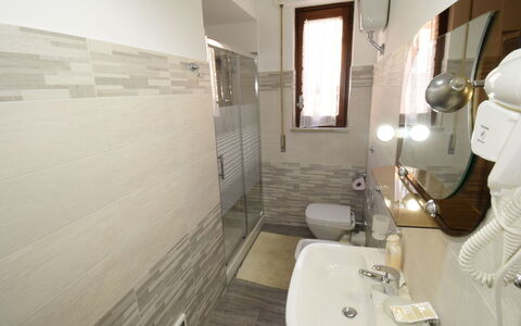 Sinago: Bathroom, Property, Room, Tile, Interior Design, Floor, Wall, Plumbing Fixture, Architecture, Real Estate