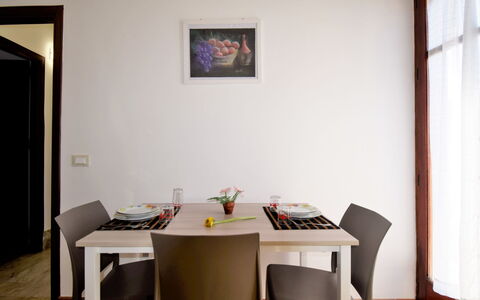 Sinago: Table, Furniture, Property, Building, Picture Frame, Interior Design, Wood, Architecture, Yellow, Floor