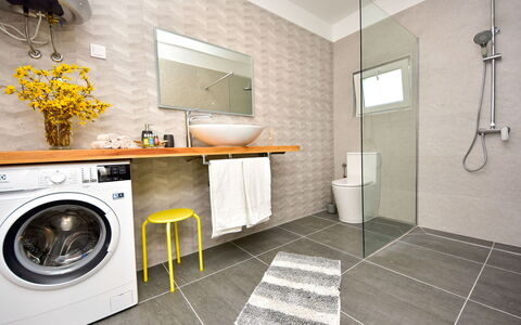 Ivan: Room, Property, Tile, Bathroom, Yellow, Floor, Interior Design, Sink, Furniture, Laundry Room