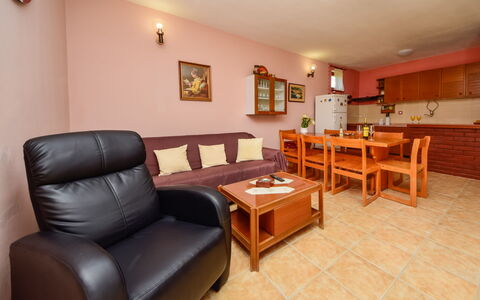 Lolita: Room, Property, Furniture, Building, Interior Design, Real Estate, Floor, Living Room, Table, Ceiling