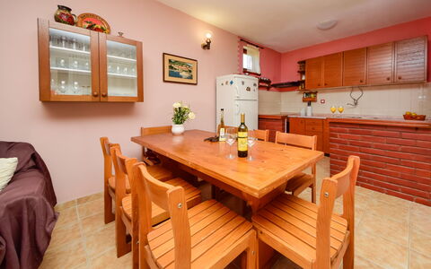 Lolita: Room, Furniture, Property, Real Estate, Table, Building, Interior Design, Dining Room, House, Hardwood