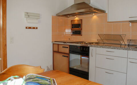 Ai Casell: Countertop, Room, Property, Kitchen, Cabinetry, Kitchen Stove, Furniture, Building, Exhaust Hood, House