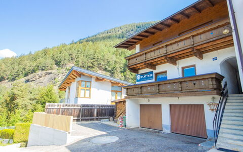 Plattner: Sky, Building, Property, Plant, Mountain, Window, Architecture, Slope, House, Road Surface