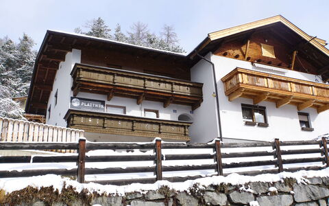 Plattner: Sky, Building, Wood, Snow, Window, House, Stairs, Cottage, Fence, Tree