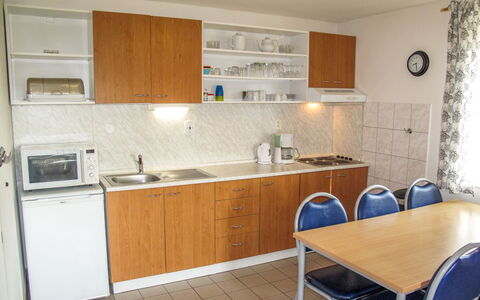 Holiday Hill 28: Property, Room, Furniture, Kitchen, Countertop, Cabinetry, Building, House, Tile, Real Estate