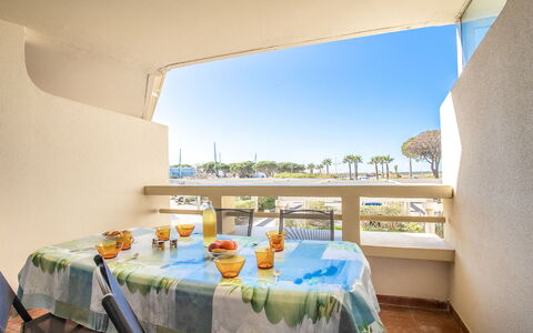 Ulysse Port de Plage: Table, Building, Property, Furniture, Tableware, Sky, Azure, Interior Design, Chair, Architecture
