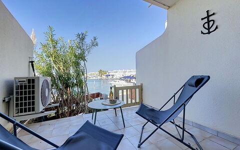 Port Camargue 205: Furniture, Apartment, Chair, Shade, Balcony, Outdoor Furniture, Watercraft, Boat, Resort, Marina