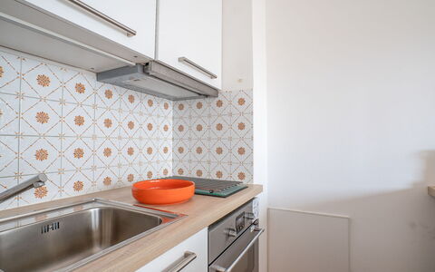 Saint Patrick: Property, Orange, Room, Furniture, Kitchen, Tile, House, Countertop, Interior Design, Cabinetry