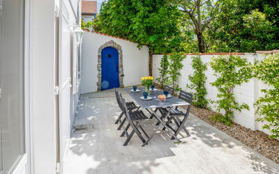 Saint Palais sur Mer 148: Table, Plant, Building, Property, Furniture, Chair, Tree, Outdoor Furniture, Outdoor Table, Road Surface