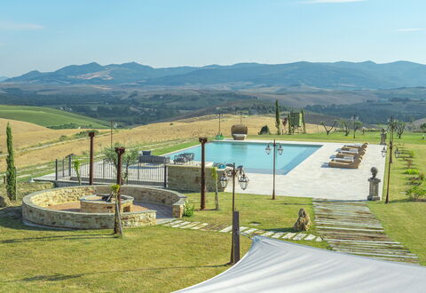 Villa Massimiliano: Sky, Mountain, Water, Cloud, Shade, Land Lot, Grass, Swimming Pool, Natural Landscape, Plant