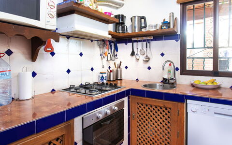 La Cordobilla: Cabinetry, Countertop, Tap, Window, Sink, Kitchen Stove, Picture Frame, Kitchen, Kitchen Appliance, Interior Design