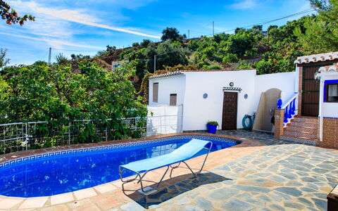 La Cordobilla: Cloud, Sky, Water, Property, Furniture, Blue, Building, Swimming Pool, Azure, Plant