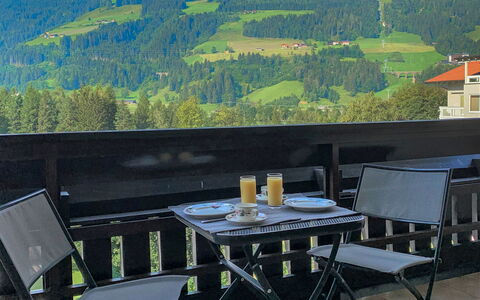 Rose: Property, Table, Hill Station, Mountain, Furniture, Room, House, Restaurant, Tree, Mountain Range
