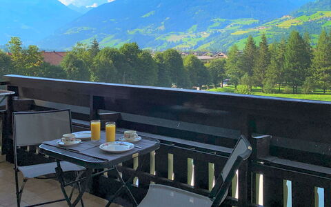 Rose: Sky, Daytime, Cloud, Property, Mountain, Table, Tree, Outdoor Furniture, Natural Landscape, Wood