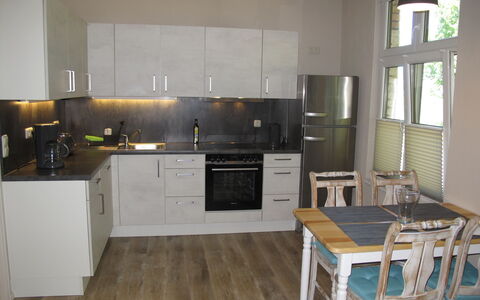 Helene: Room, Furniture, Kitchen, Property, Countertop, Cabinetry, Floor, Wood Flooring, Interior Design, Building