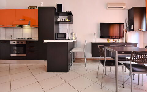 Rosolina Mare 900: Cabinetry, Countertop, Table, Building, Kitchen Stove, Kitchen Appliance, Home Appliance, Wood, Kitchen, Floor