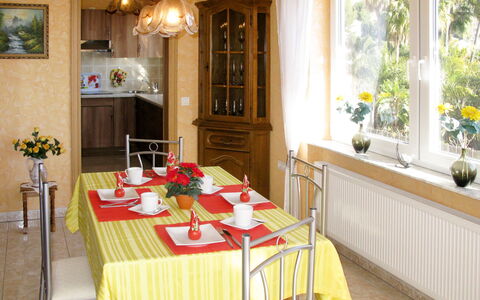 Salz: Table, Furniture, Property, Flower, Plant, Cabinetry, Chair, Countertop, Tableware, Wood