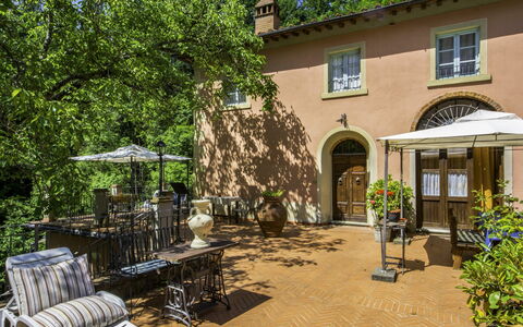 Il Mulinaccio: Plant, Window, Building, Chair, Shade, Outdoor Furniture, Table, Tree, Sky, House