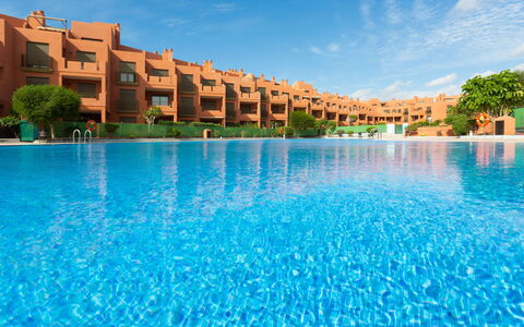 Sunny Tejita: Swimming Pool, Resort, Resort Town, Azure, Building, Town, Aqua, Leisure, Water, Vacation