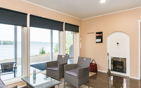 Villa Leinola 1: Furniture, Chair, Outdoor Furniture, Table, Wood, Outdoor Table, Kitchen & Dining Room Table, Shade, Garden, Umbrella