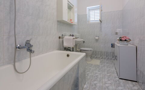 Tea: Bathtub, Plumbing Fixture, Property, Tap, Building, Window, Bathroom, Interior Design, Architecture