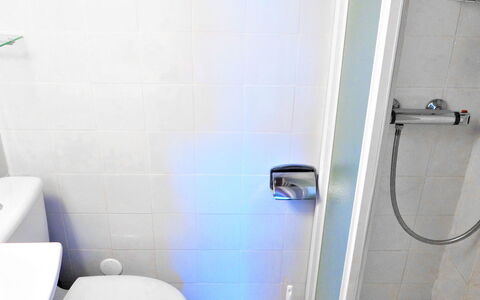 L'Hacienda: Plumbing Fixture, Bathroom, Purple, Interior Design, Toilet, Tap, Plumbing, Line, Wall