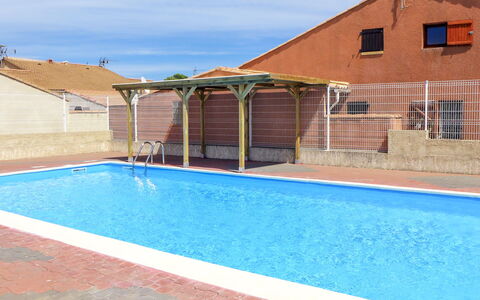 L'Hacienda: Water, Sky, Property, Swimming Pool, Plant, Building, Azure, Wood, Shade, Architecture