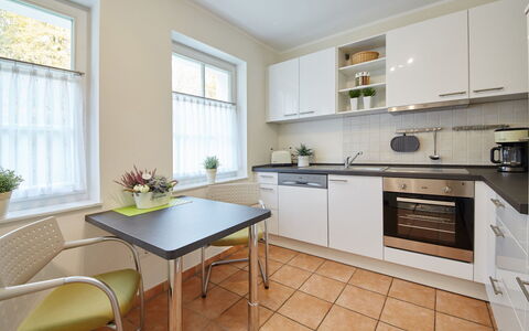 Am Golf- und Reitpark: Room, Property, Furniture, Kitchen, Countertop, Interior Design, Building, Cabinetry, Floor, Real Estate