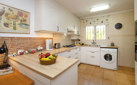 Vega: Property, Room, Kitchen, Countertop, Furniture, Cabinetry, Real Estate, Yellow, Building, Interior Design