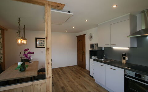 Kröll: Cabinetry, Countertop, Wood, Lighting, Drawer, Kitchen, Architecture, Building, Floor