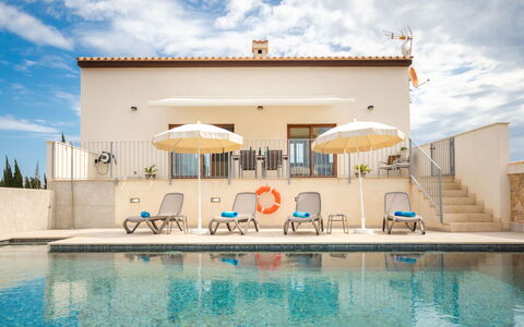 Son Vivot: Water, Cloud, Sky, Building, Swimming Pool, Blue, Umbrella, House, Window, Leisure