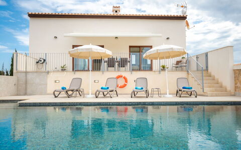 Son Vivot: Water, Cloud, Sky, Property, Building, Swimming Pool, Umbrella, Azure, Blue, Window