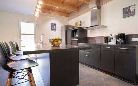 Villa Heol: Furniture, Kitchen, Countertop, Interior Design, Flooring, Cabinetry, Floor, Wood Flooring, Wood, Ceiling