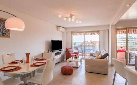 Etoile de Mer: Furniture, Table, Orange, Wood, Interior Design, Living Room, Lighting, Couch, Building, Flooring