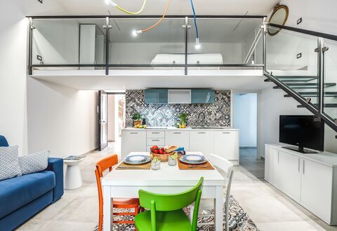 Loft In Sorrento: Table, Furniture, Property, Cabinetry, Couch, Blue, Building, Interior Design, Lighting, Countertop