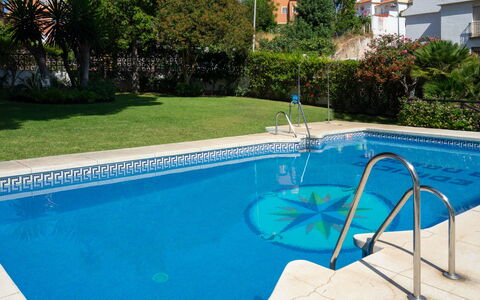 La Dorada: Swimming Pool, Property, Leisure, Real Estate, House, Grass, Building, Tree, Apartment, Vacation