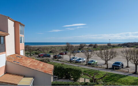 Narbonne-Plage 120: Sky, Cloud, Plant, Car, Building, Vehicle, Window, Tree, Urban Design, Water