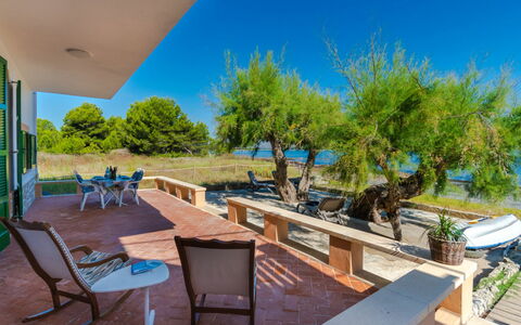 Sa Marina: Sky, Plant, Furniture, Azure, Blue, Outdoor Furniture, Wood, Shade, Building, Swimming Pool