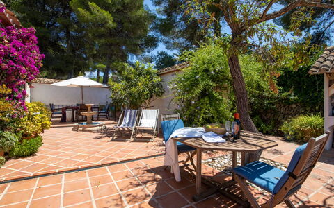 Villa Lander: Plant, Furniture, Table, Chair, Tree, Outdoor Furniture, Shade, Outdoor Table, Leisure, Landscape