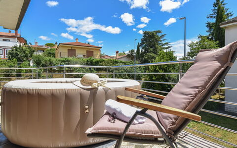 Aurora: Sky, Cloud, Furniture, Property, Building, Plant, Outdoor Furniture, Wood, Chair, House