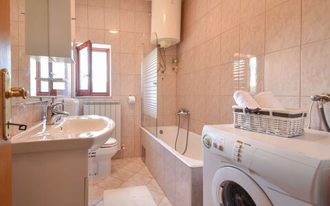 Aurora: Laundry Room, Brown, Plumbing Fixture, Tap, Sink, Mirror, Clothes Dryer, Bathroom Sink, Washing Machine, Bathroom
